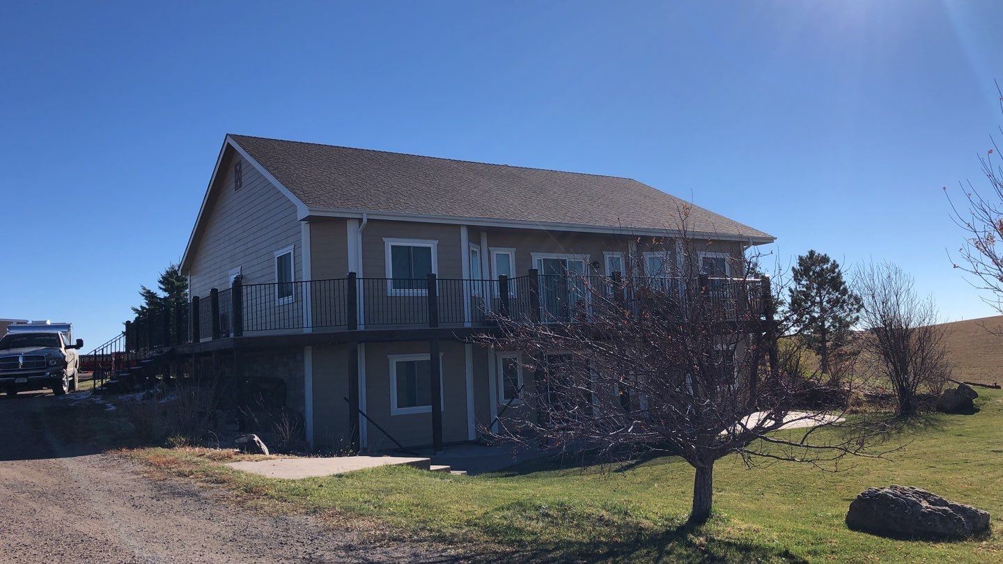 Residential Roofing Installation using Metal roofing by American Roofing & Construction LLC