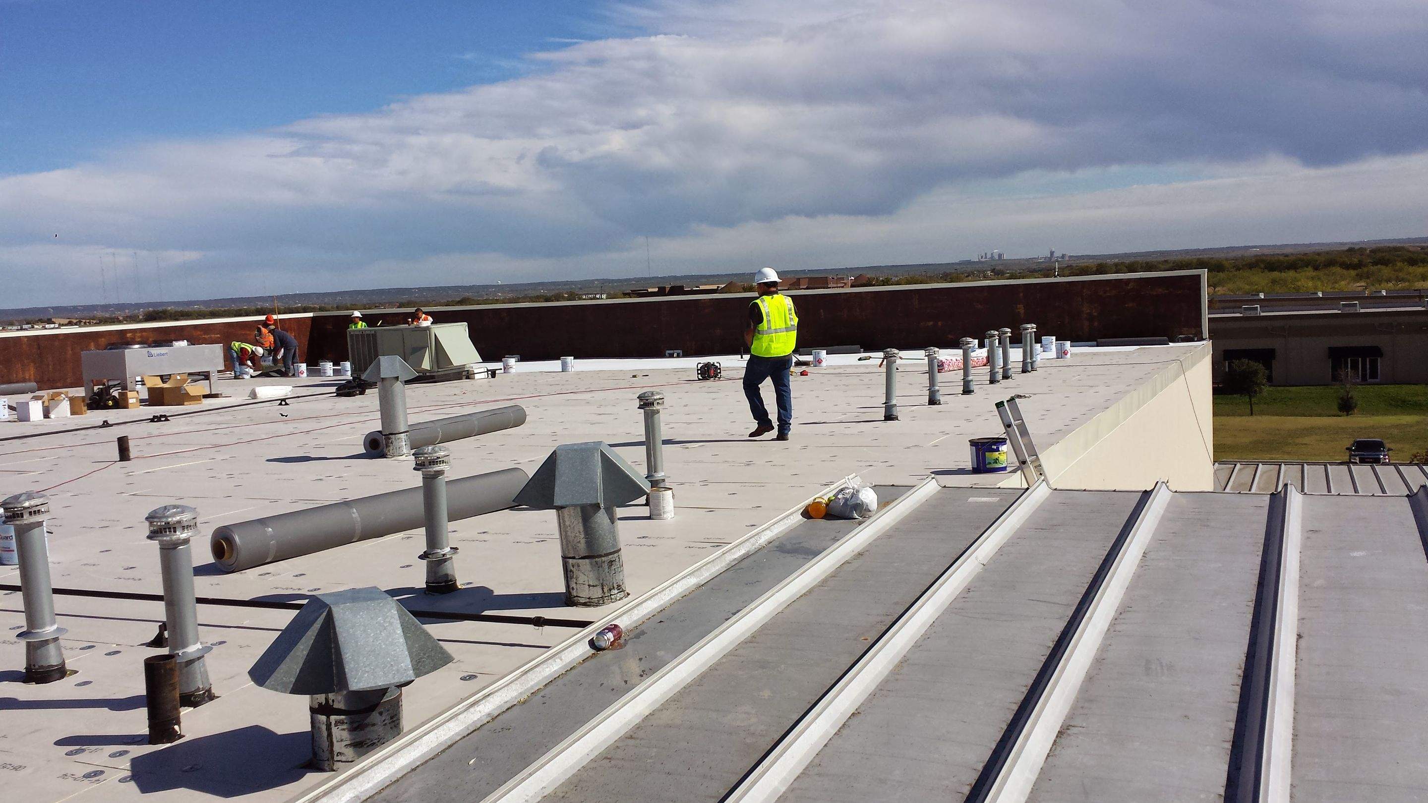 GAF TPO Fully Adhered Flat Roof Project by First United Roofing & Construction