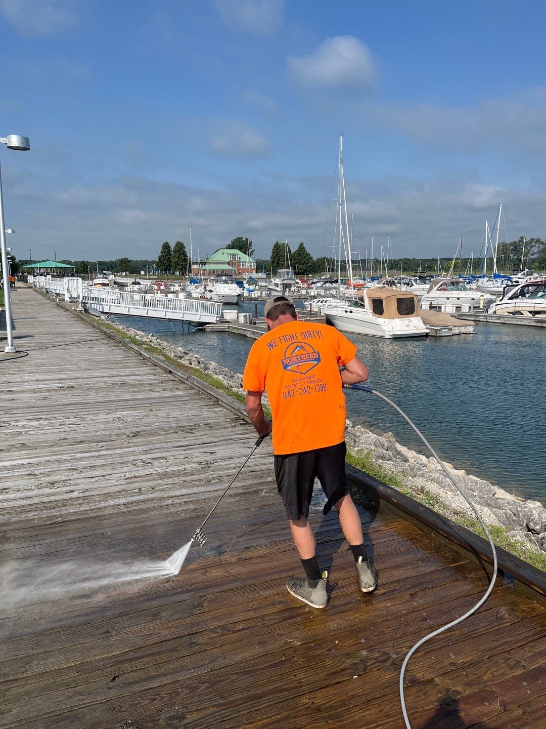 wood promenade cleaning by Northern Power Washing LLC.