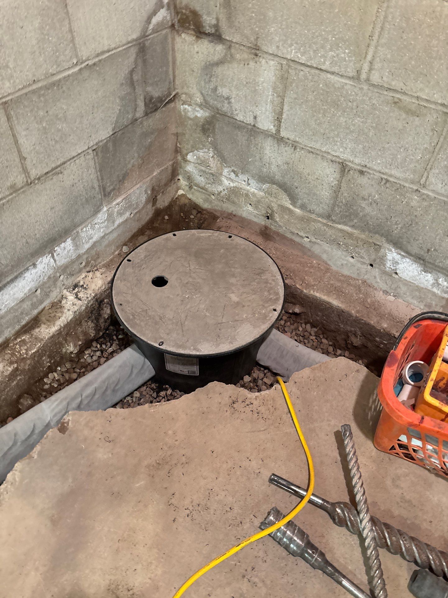 Interior Drain Tile & Buried Discharge in South Minneapolis by Waterproofing Northeast
