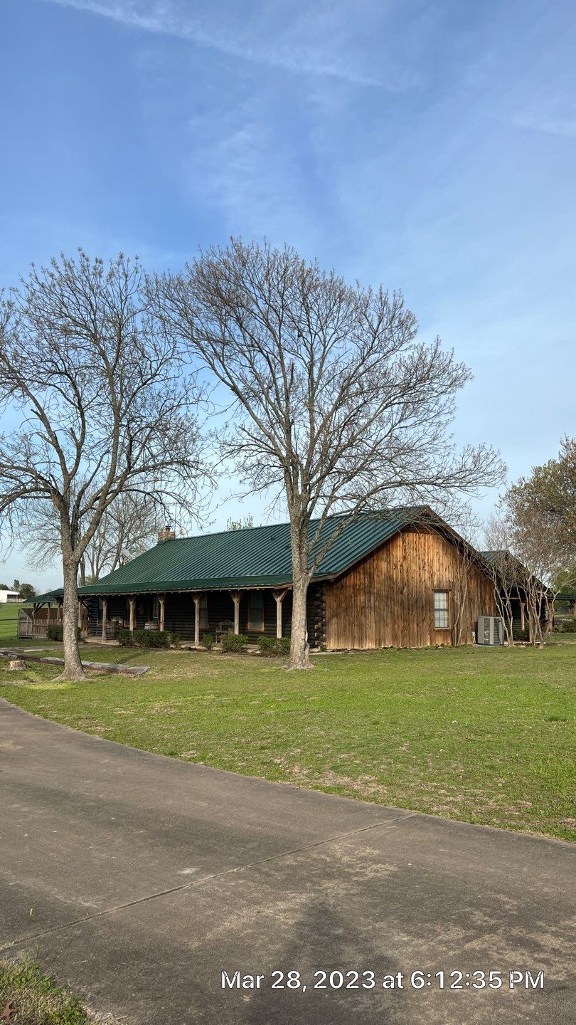 Shingle to Standing Seam Metal Roof by Springtree Restoration 