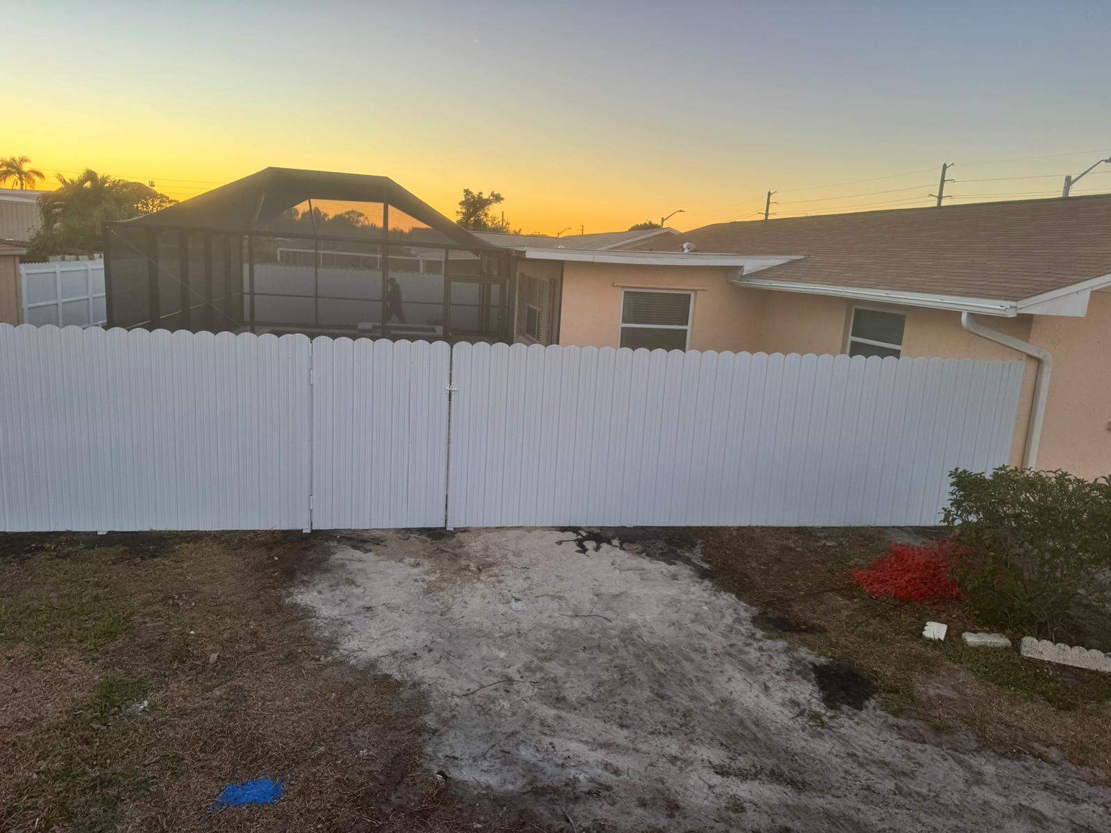 White Vinyl Privacy Fence Installation in Bradenton, Florida by True Fence LLC