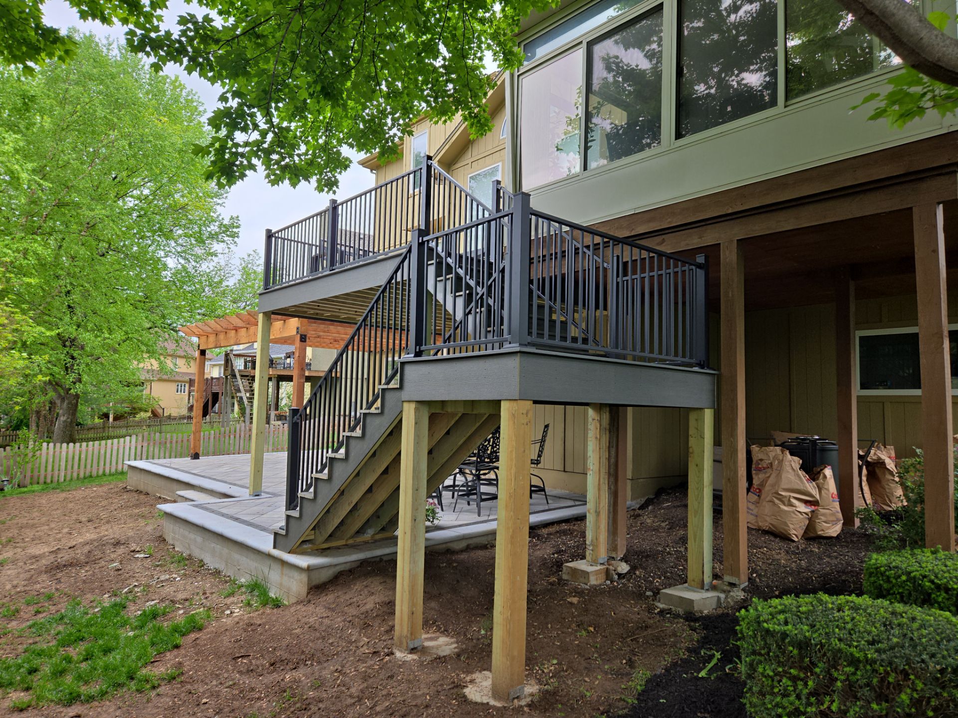 Back Yard Patio, Pergola, and Deck by LAND ESCAPES LLC