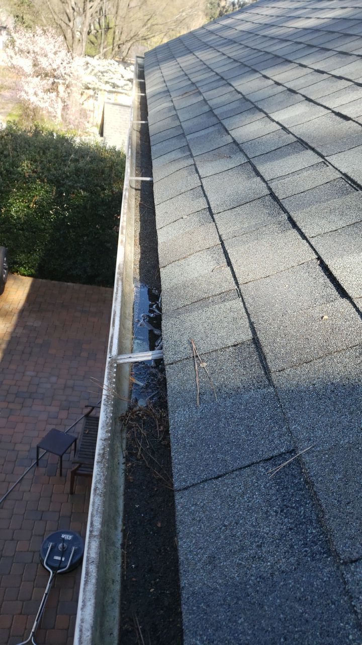 Gutter Cleaning using water by Power Wash Masters LLC