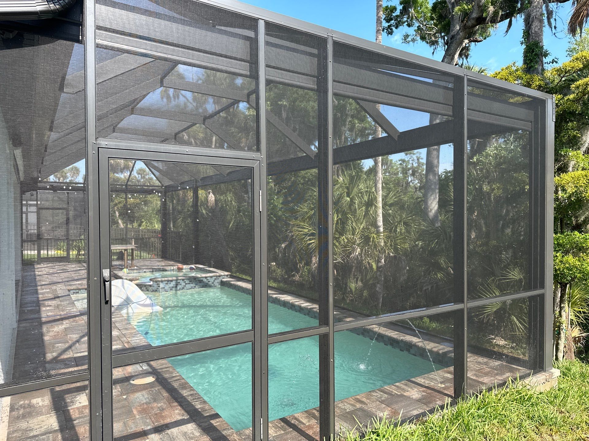 Screen Enclosure & Paver Pool Deck Cleaning in Trevesta Community, Palmetto, FL | Sunshine AquaWash by Sunshine AquaWash