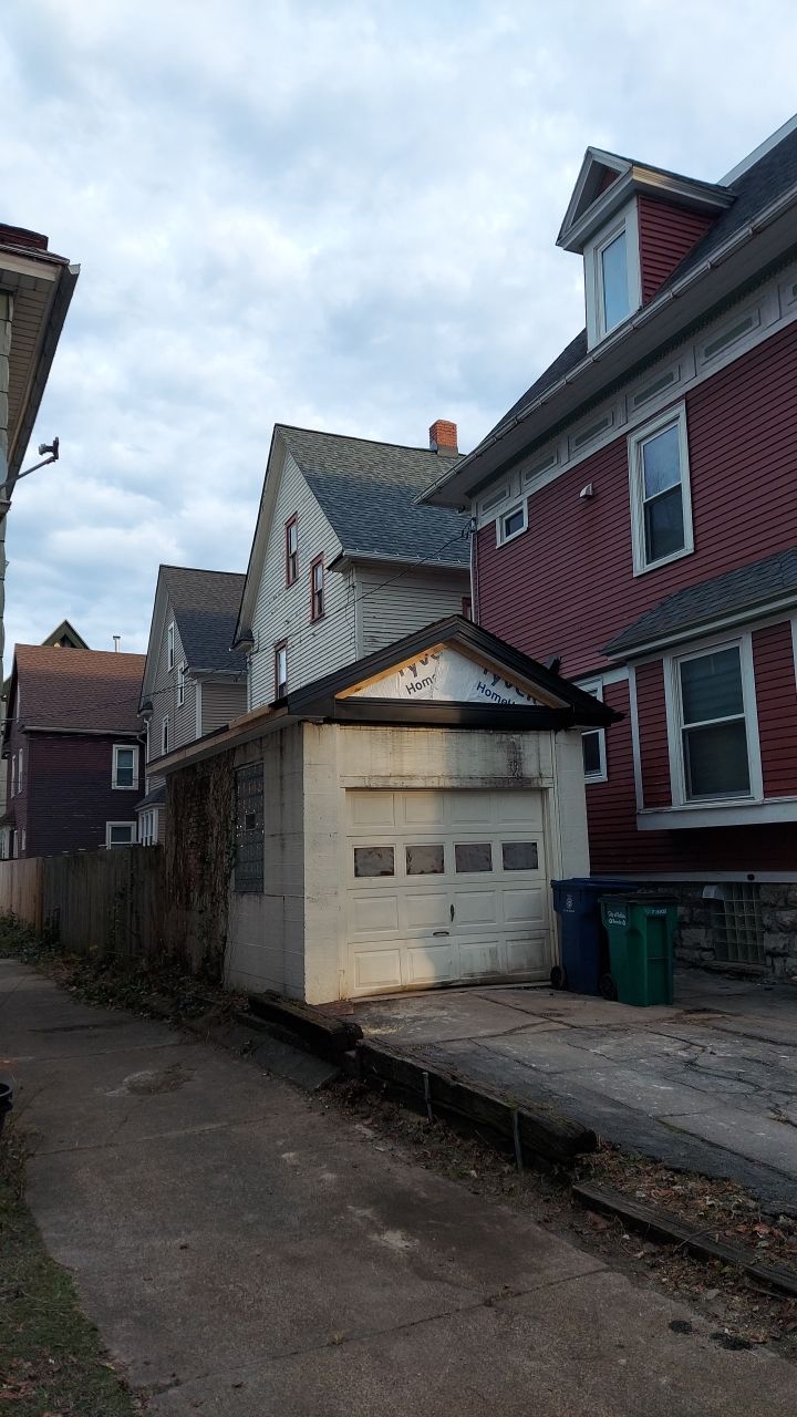 Exterior Renovations- Siding, Stamped Concrete, Porch, and Railings by Ivy Lea Construction
