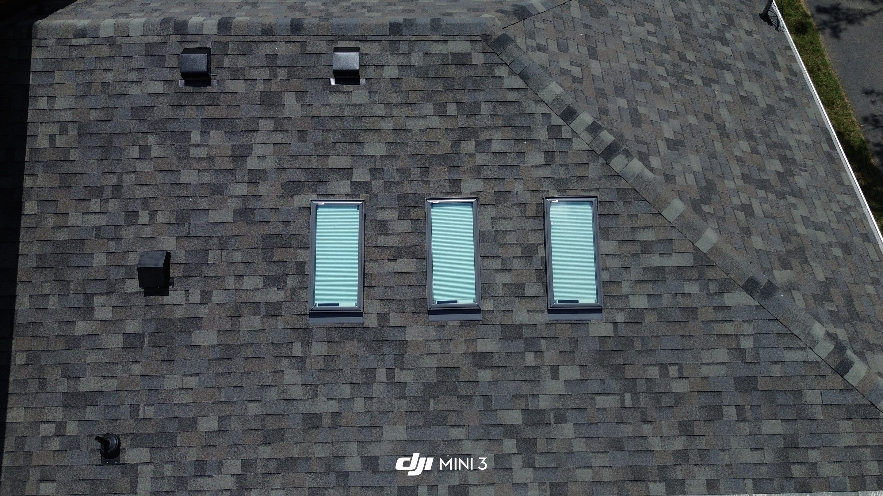 Full Roof Replacement and Skylight Installation for Franklin Colonial Home by Shinglesmiths Roofing