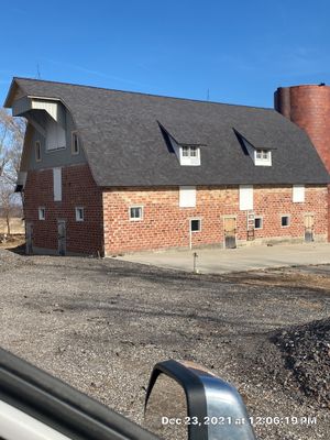Roof Replacement with upgraded needed exhaust ventilation using Malarkey Vista Class III Impact Resistant Shingles in Black Oak color
