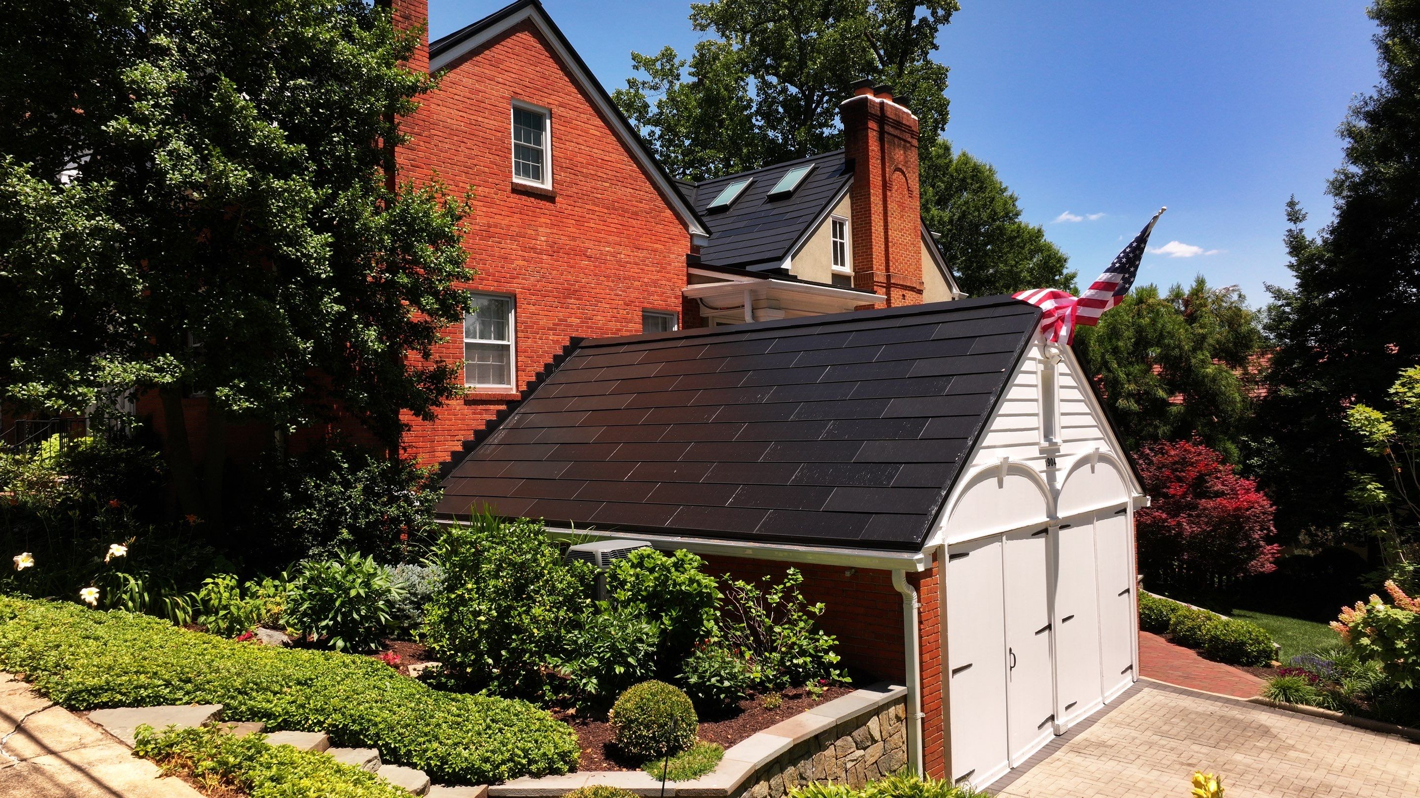Sleek Tesla Solar Roof + Powerwall Installation | Alexandria, VA by American Home Contractors