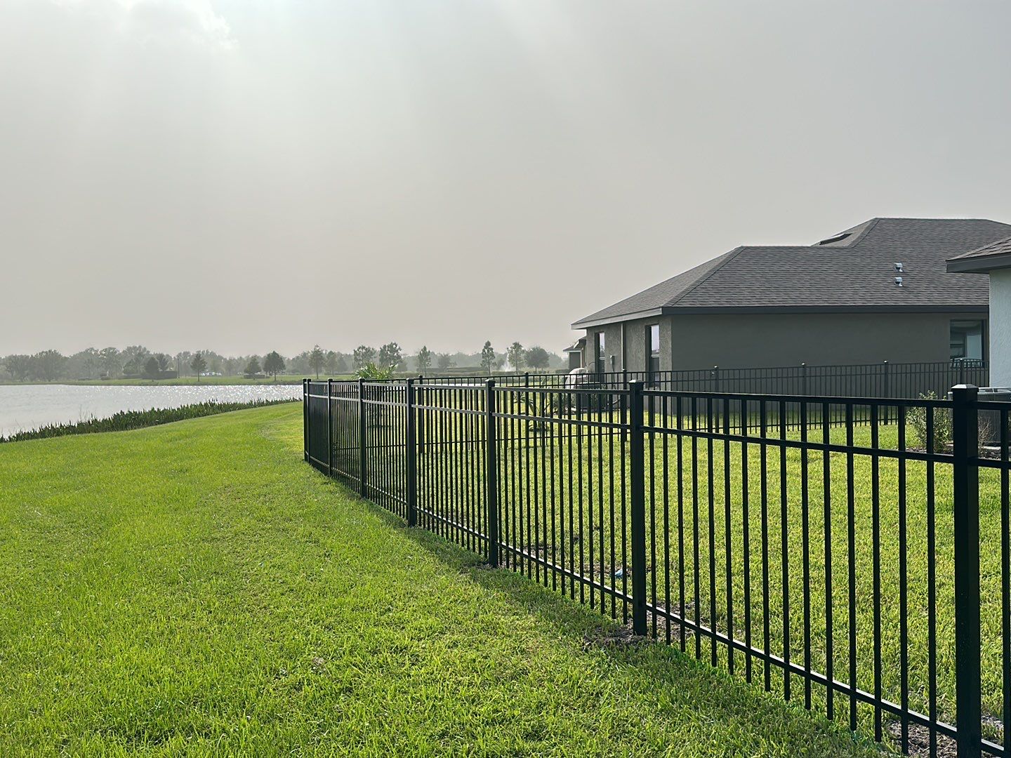 Aluminum Fence Installation using Black 3 Rail Aluminum Fence by Asap fence and gates, LLC