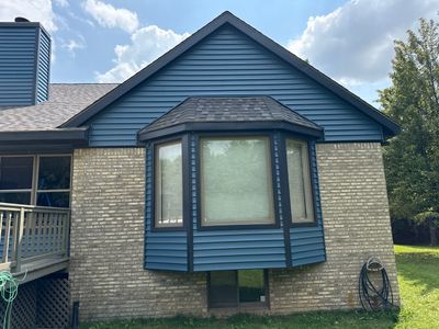 Siding Replacement using Alside Charter Oak D4.5" Laguna Blue