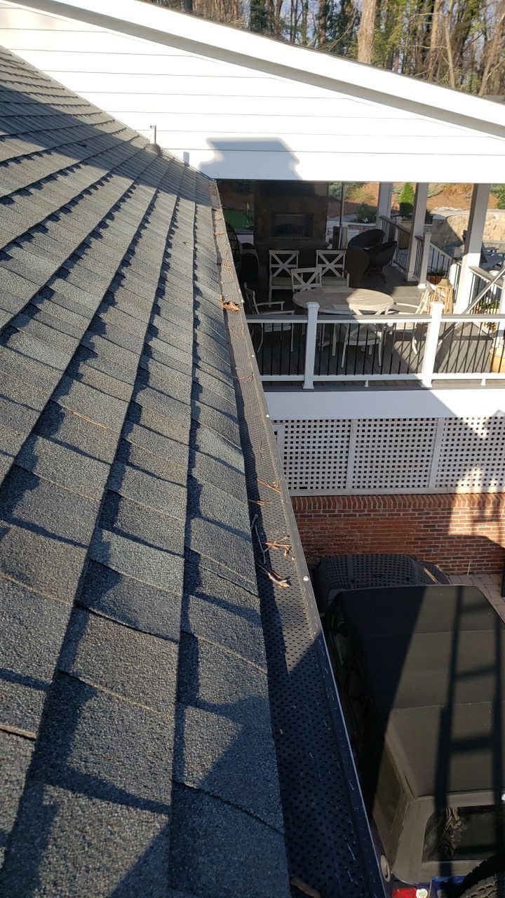 Gutter Cleaning using water by Power Wash Masters LLC