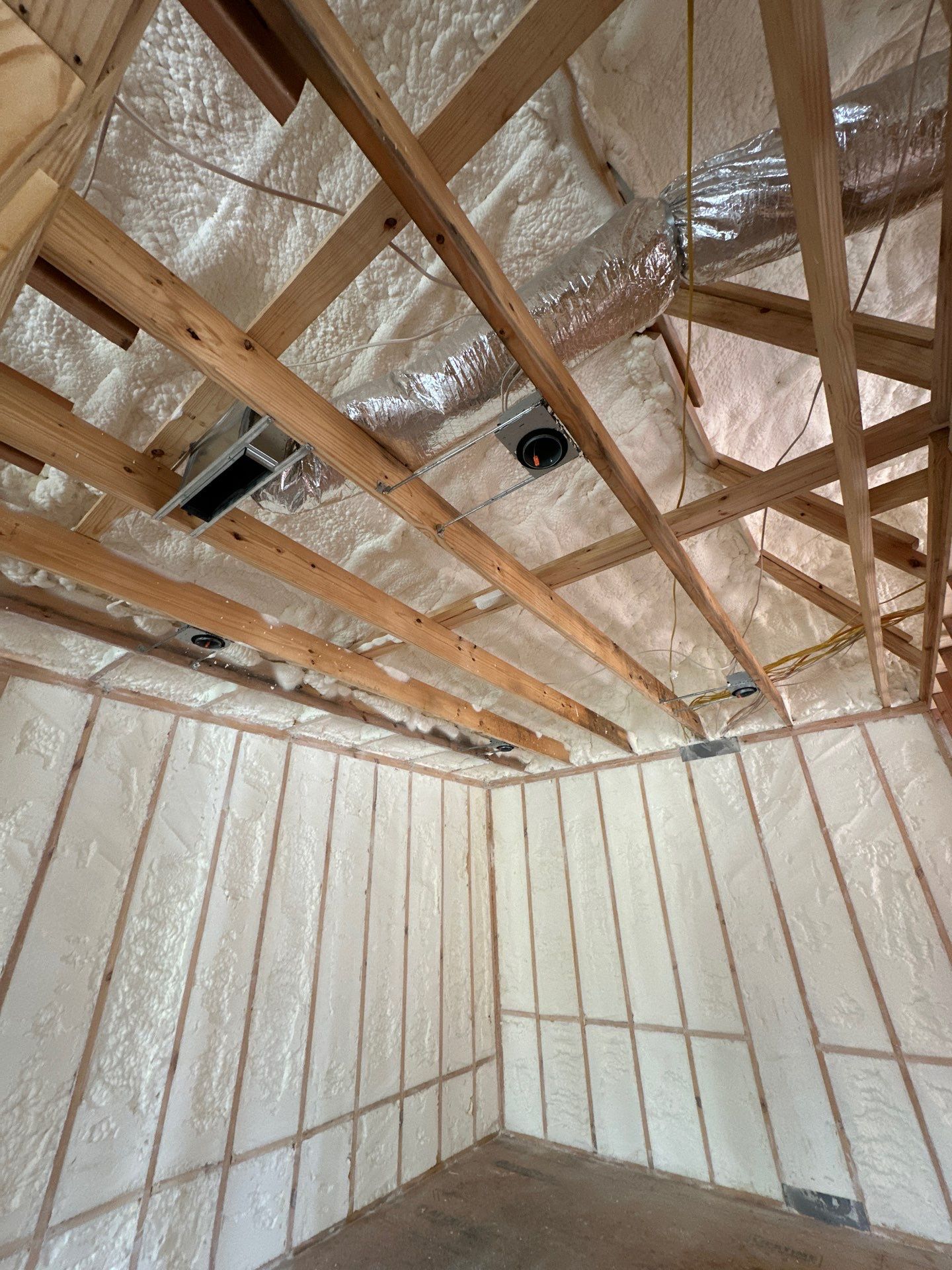 Open cell spray foam job completed at this beautiful custom home in Dallas TX by Apex Insulation Solutions