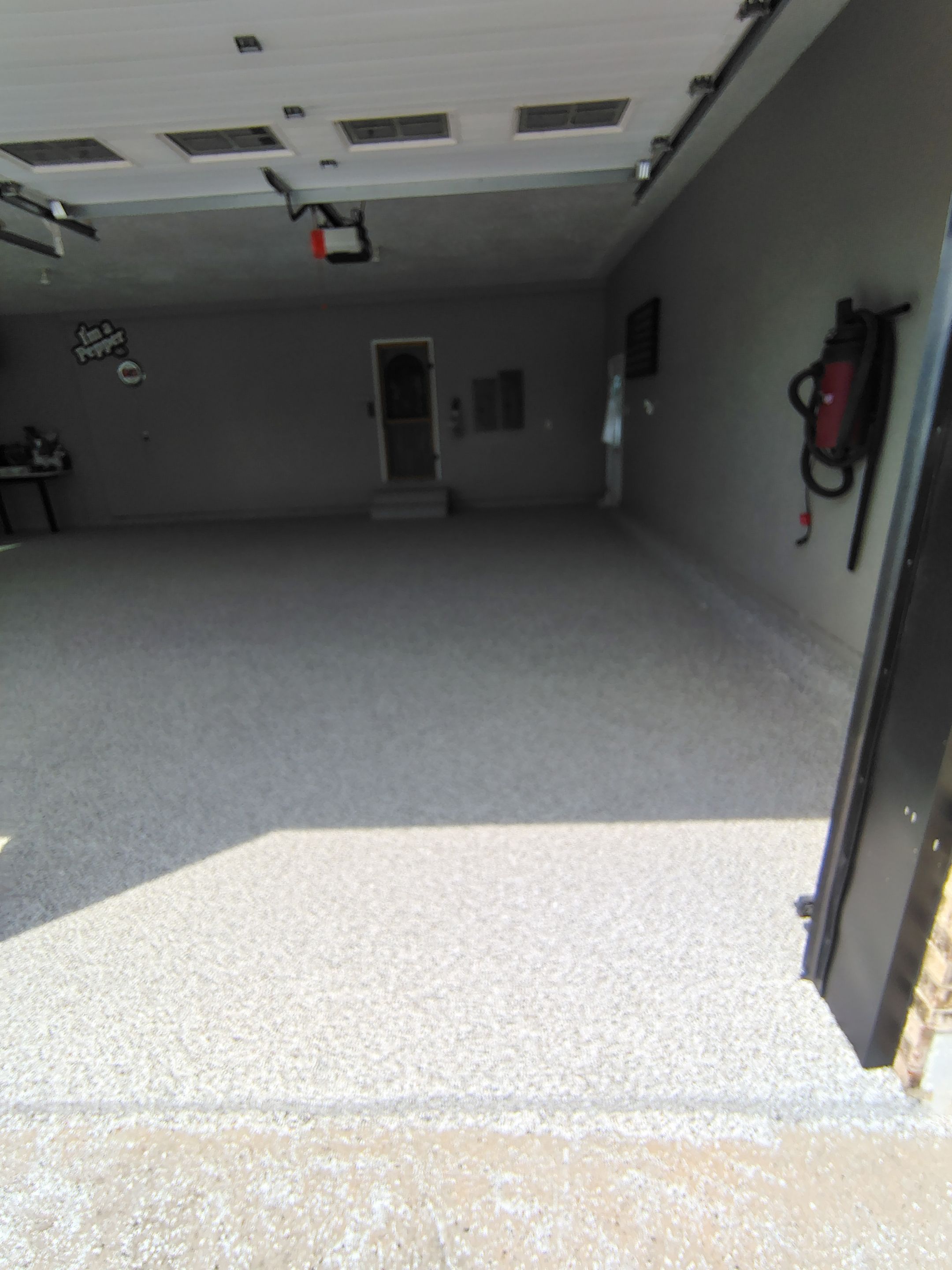 Garage Concrete Floor Coating and Crack Repair in Onawa by Select Painting, Coatings & Garage Cabinets