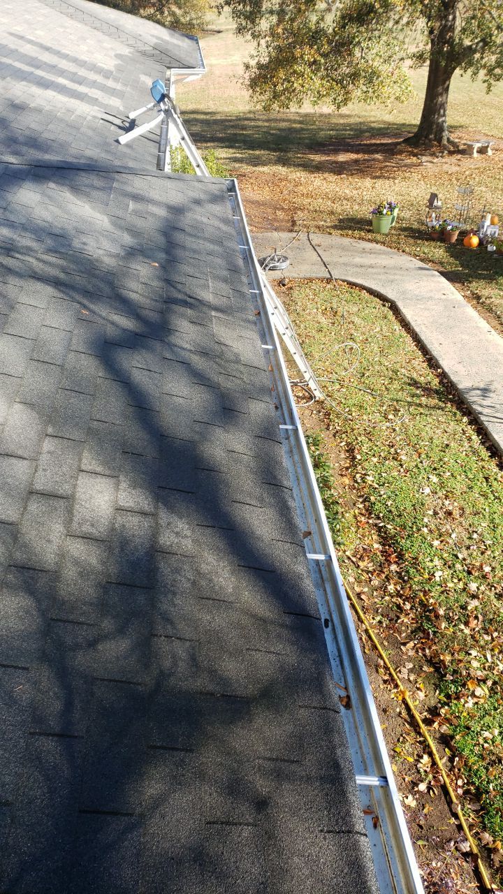 gutter cleaning and house wash and gutter guard installation by Power Wash Masters LLC