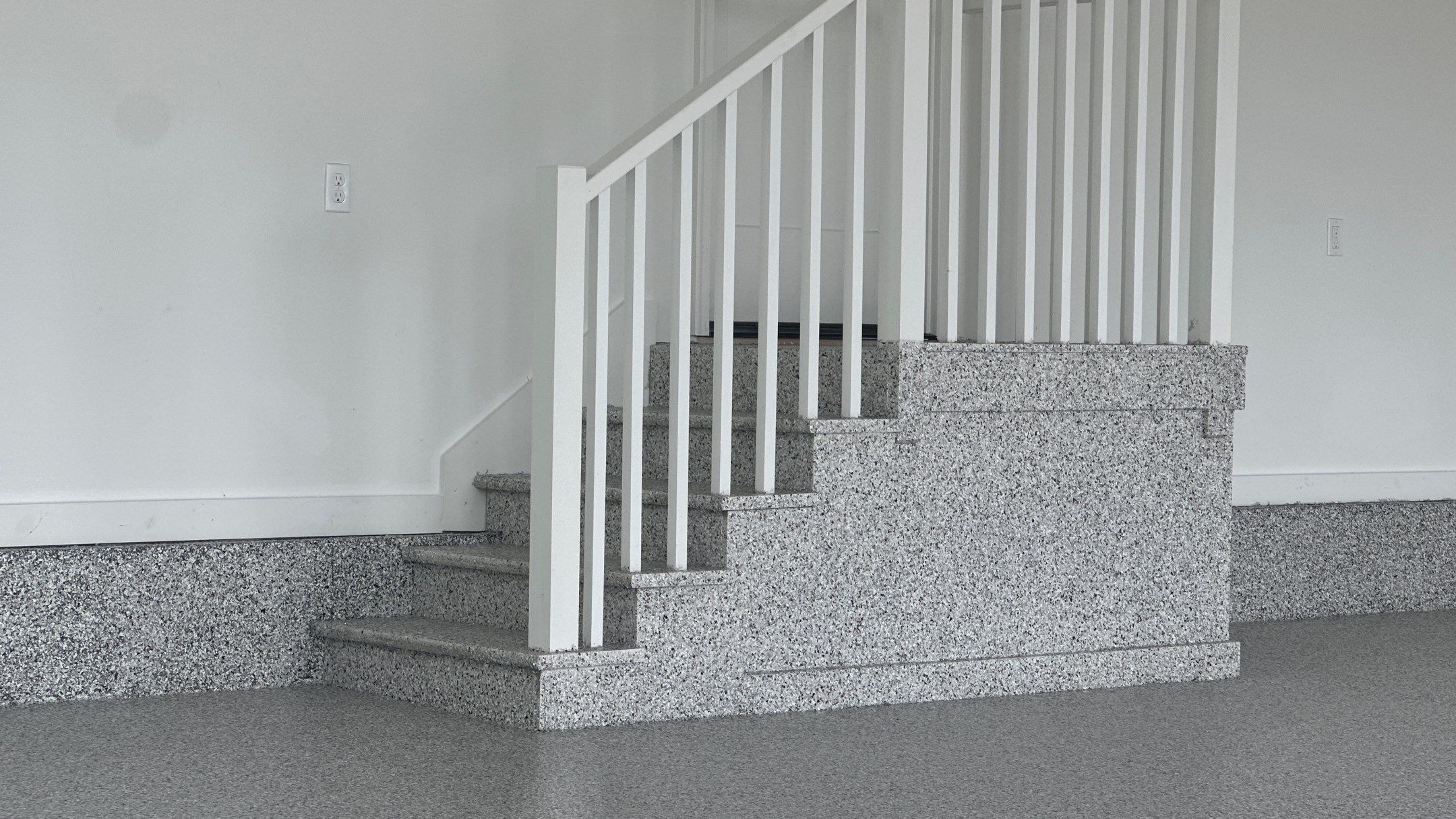 Ben B. completed his home with a new garage floor  by Banner Garage