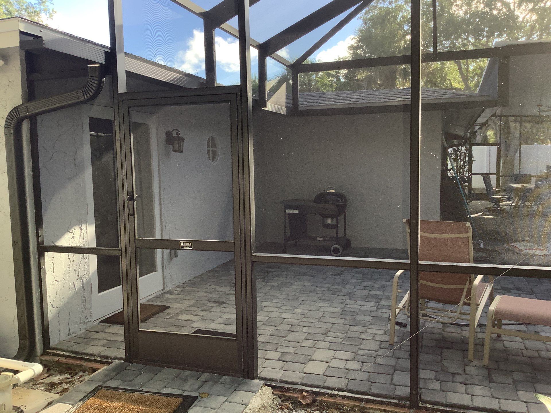 Black Seamless Gutters Installation in Siesta Key FL by Gutter Professors