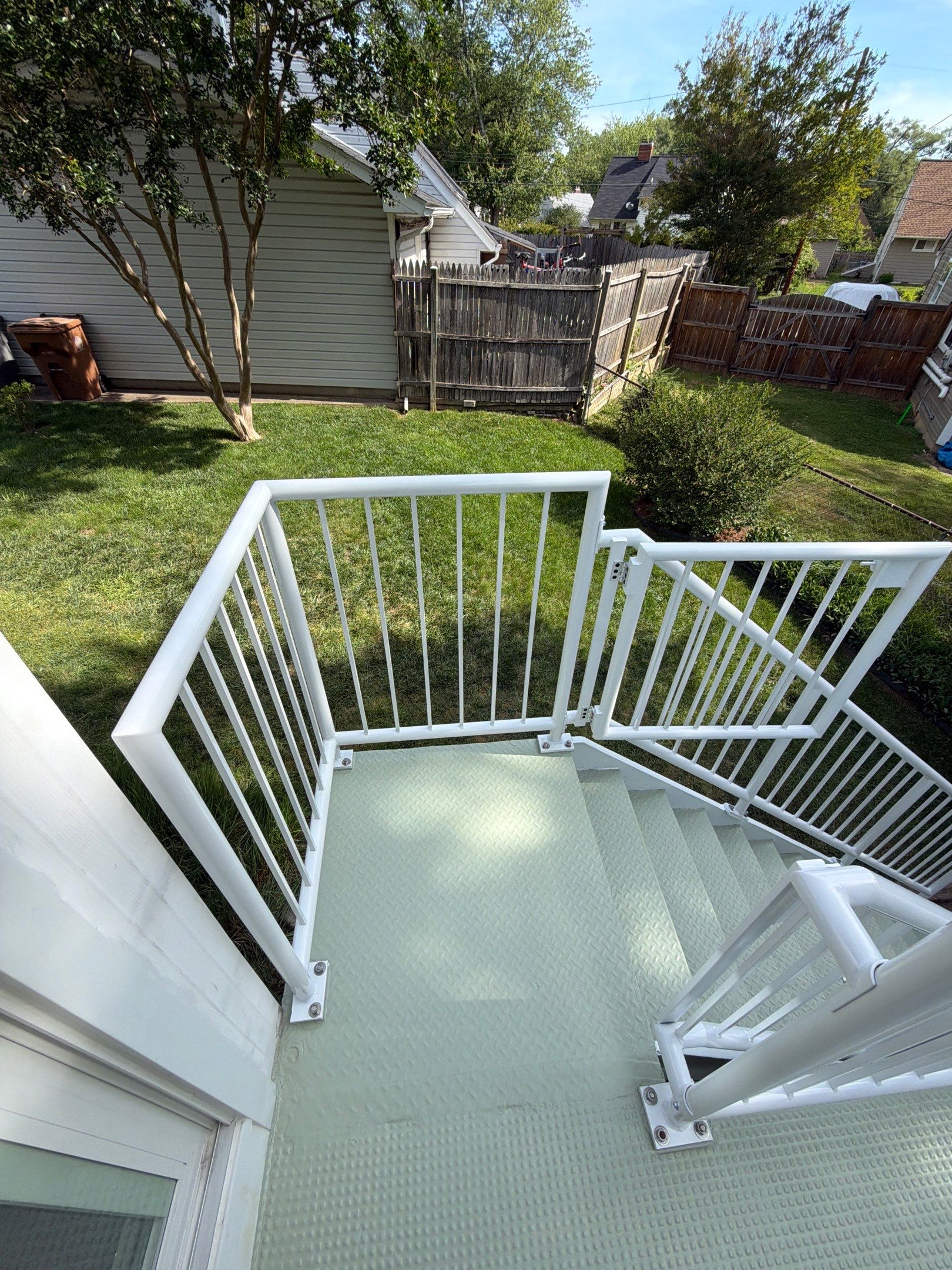 White Powder-Coated Outdoor Railings in Rockville & Staircase and Deck Refurbishment  by Capitol Iron Works