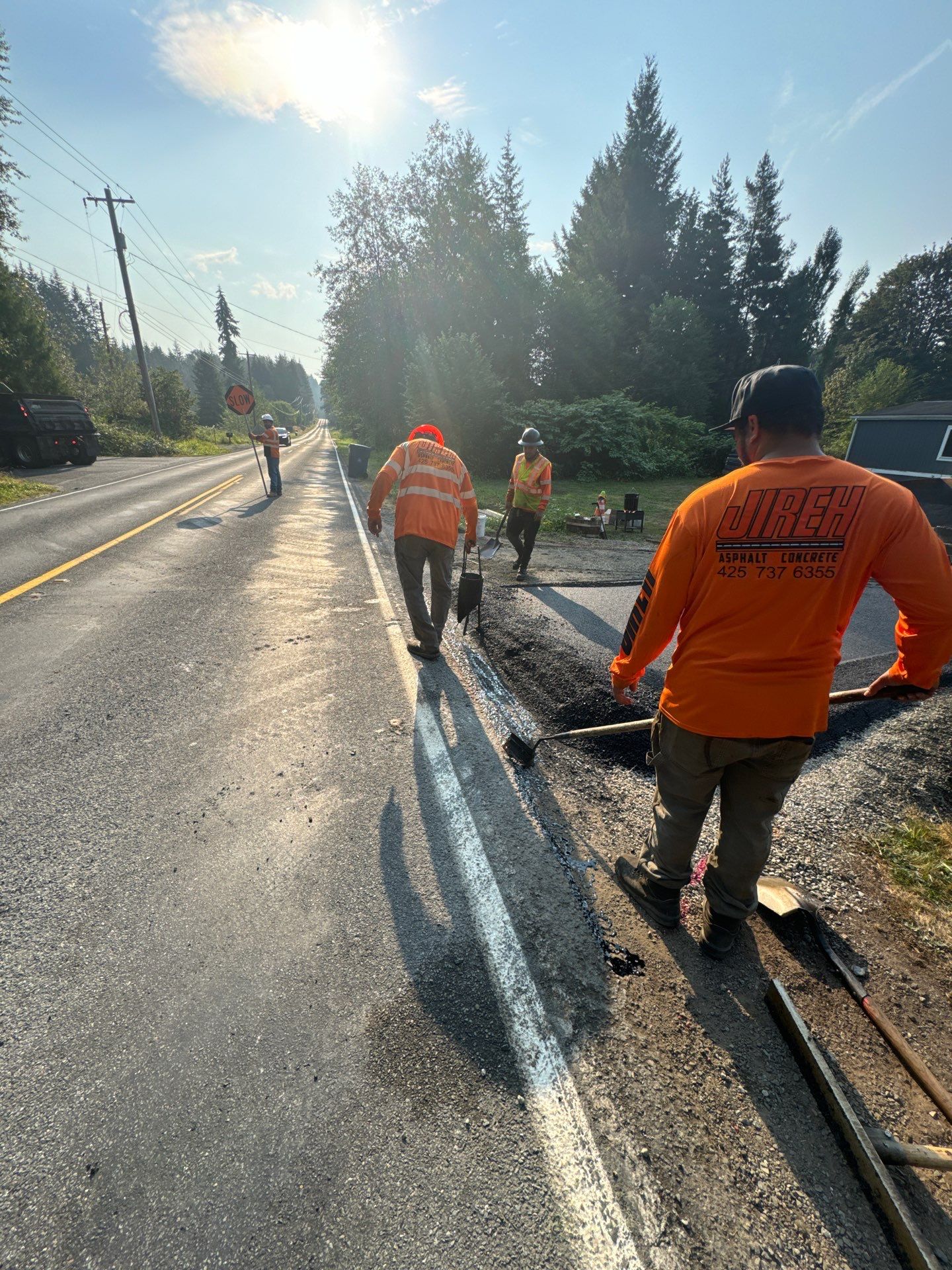 Joann | Asphalt Driveway & Retaining Wall  by Jireh Asphalt & Concrete Inc 