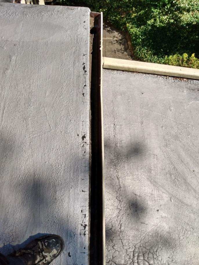 Slate Roof Repair & Gutter Cleaning in Roland Park by Roof Right Inc