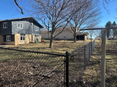 Black Chain Link Fence Installation with Double Gate in Grundy Center