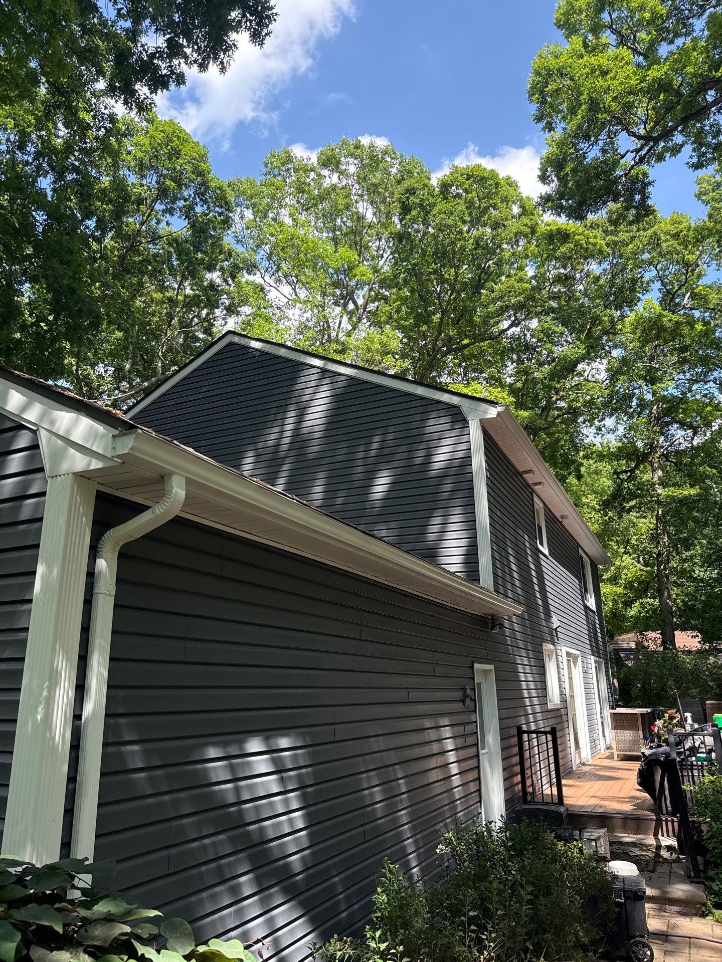 Vinyl Siding and Exterior Trim Repair for Brighton Residence by Top Shelf Painter