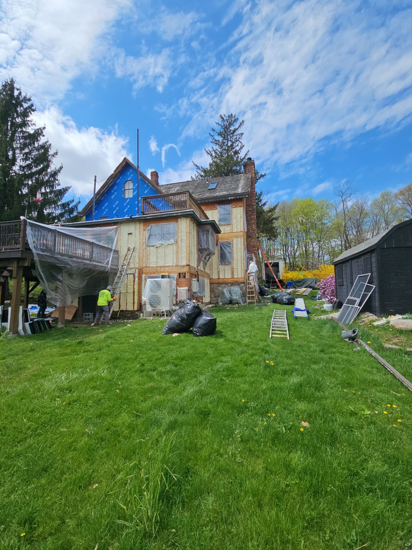 Siding Installation using Closed Cell Spray Foam by NYS Foam & Energy