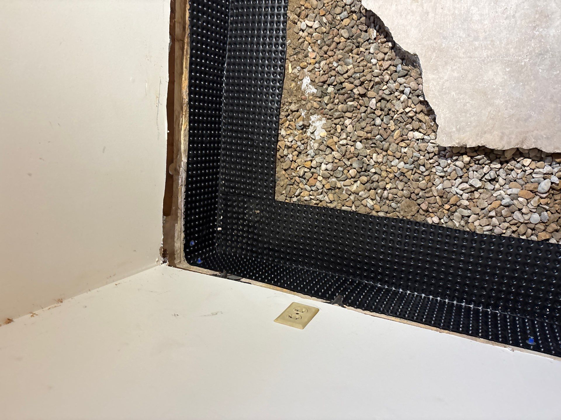 Completing the Connection for Lisa's Drain Tile System by Waterproofing Northeast