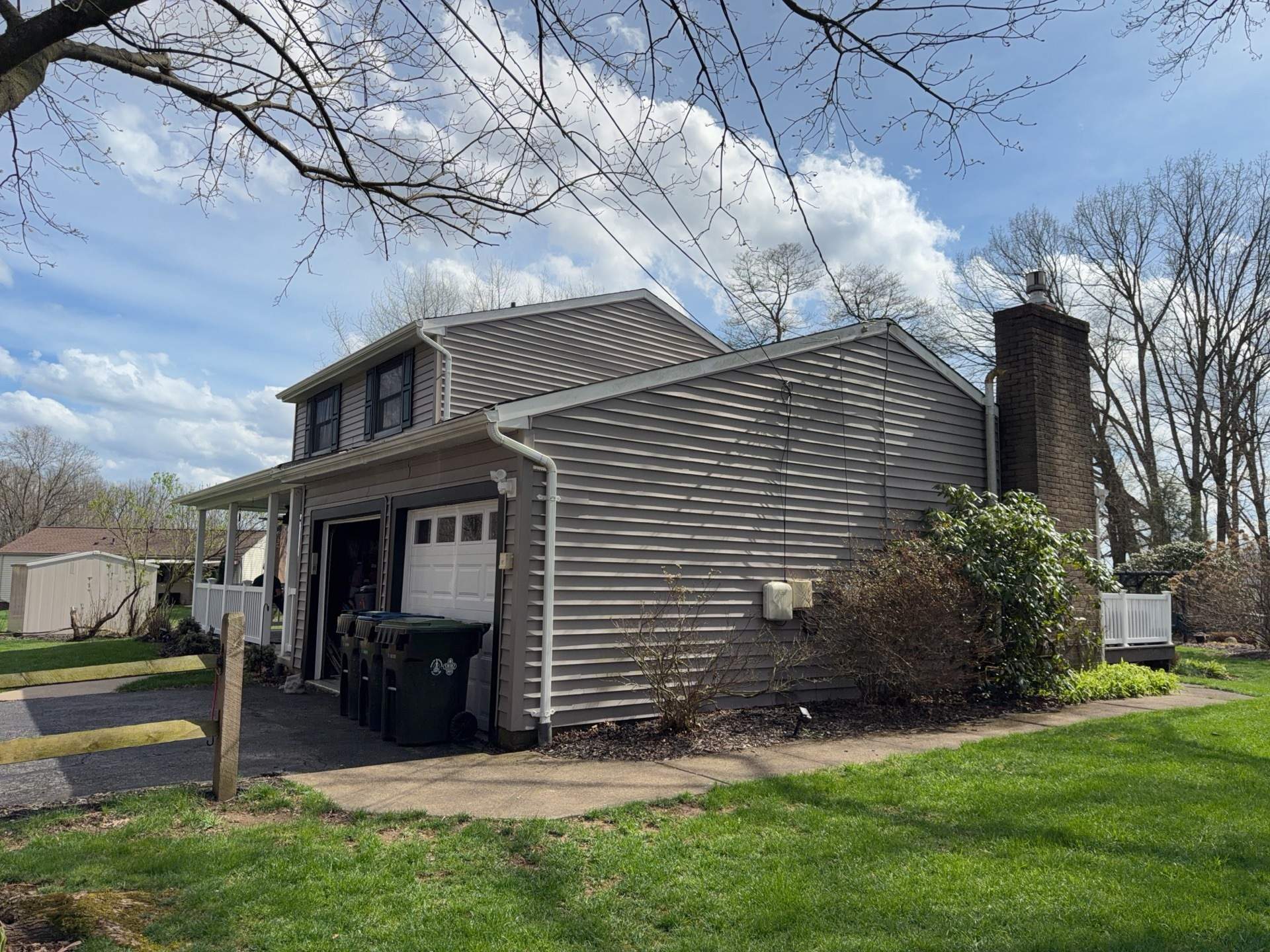 Vinyl Siding to James Hardie Arctic White with Midnight Black Trim by Ideal Siding Pittsburgh