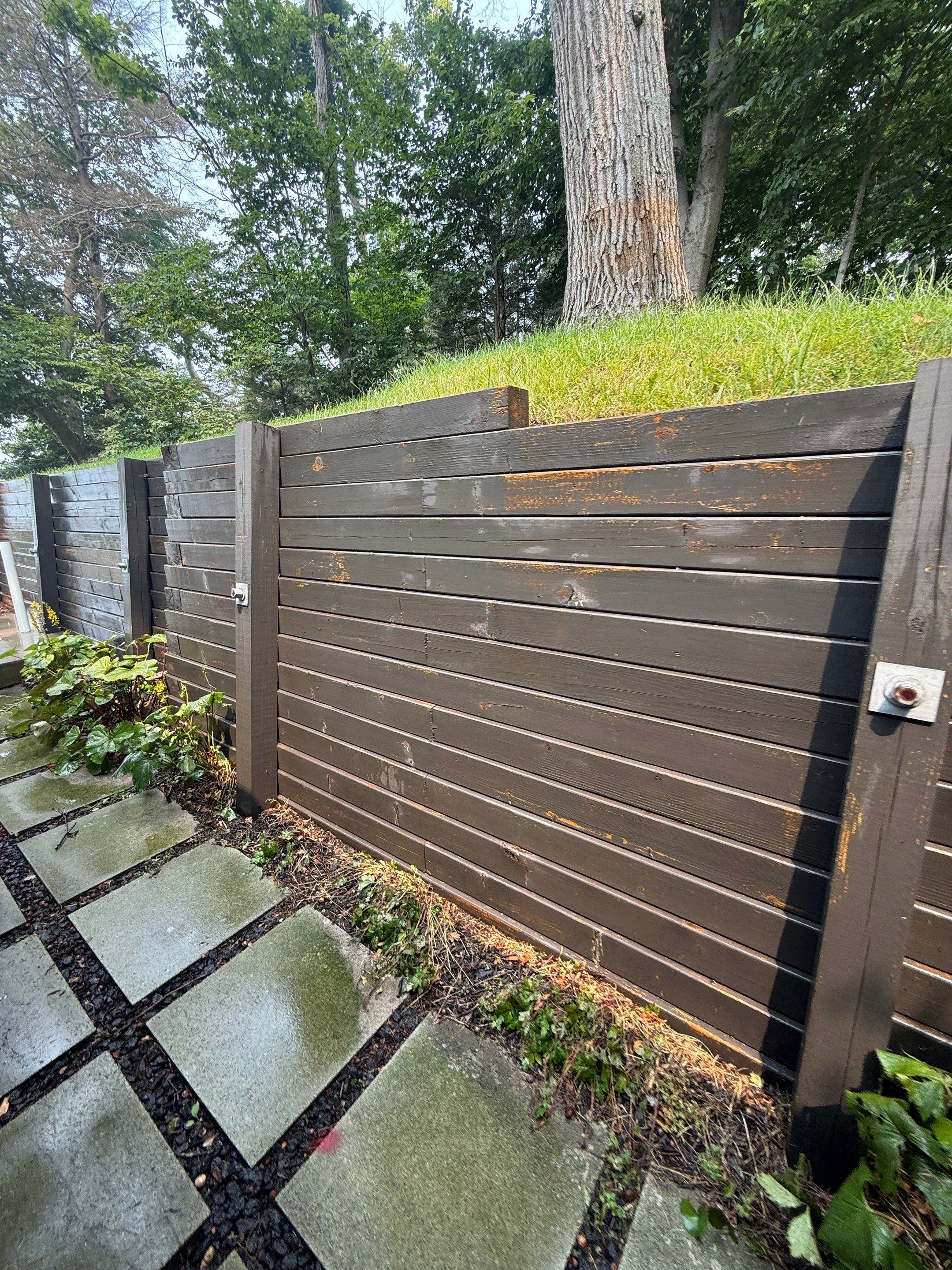Exterior Retaining Wall Painting | Grand Haven, Michigan by Gordon Painting
