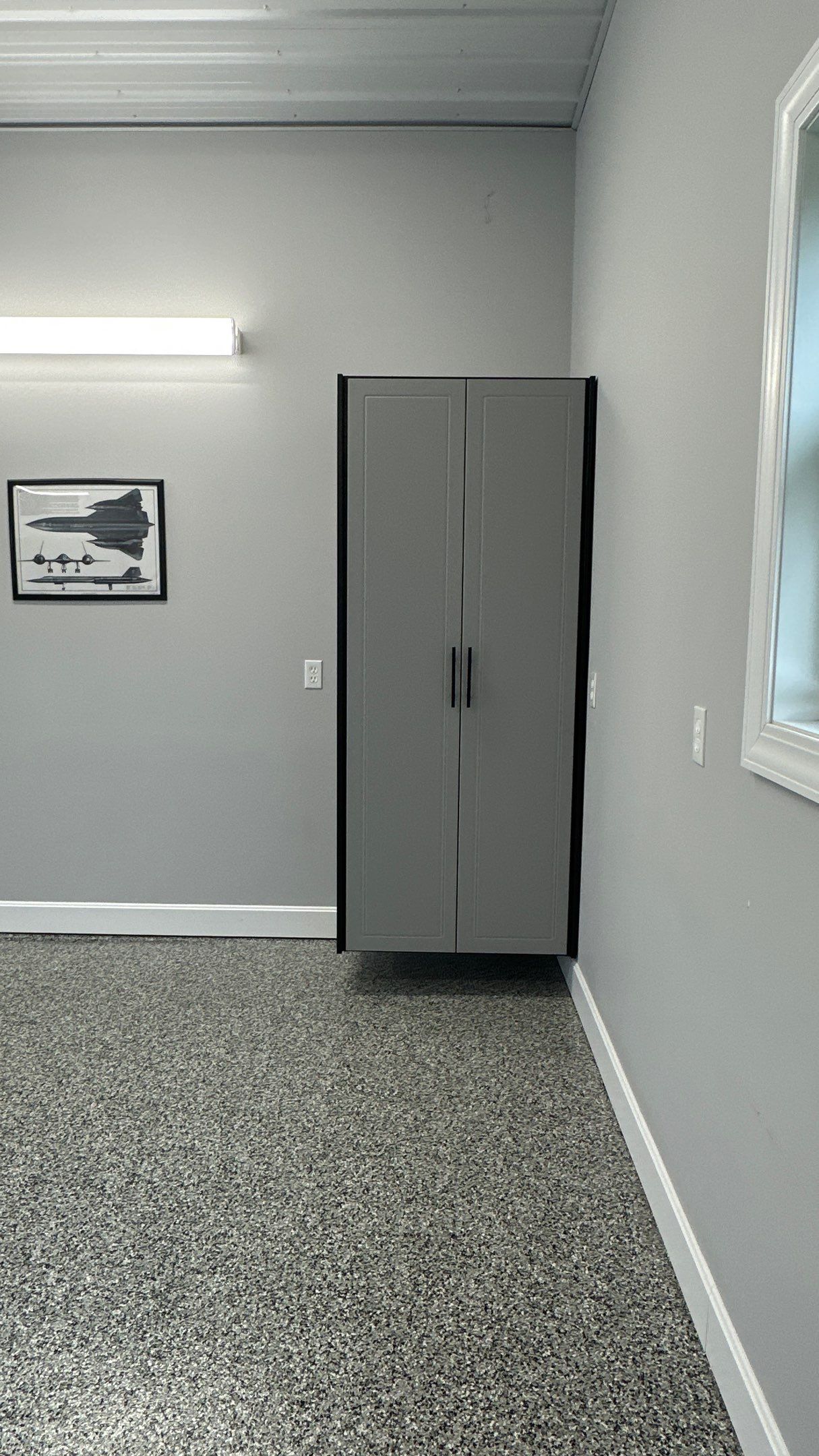 Pat F upgraded his garage with a cool Two-tone cabinet setup by Banner Garage