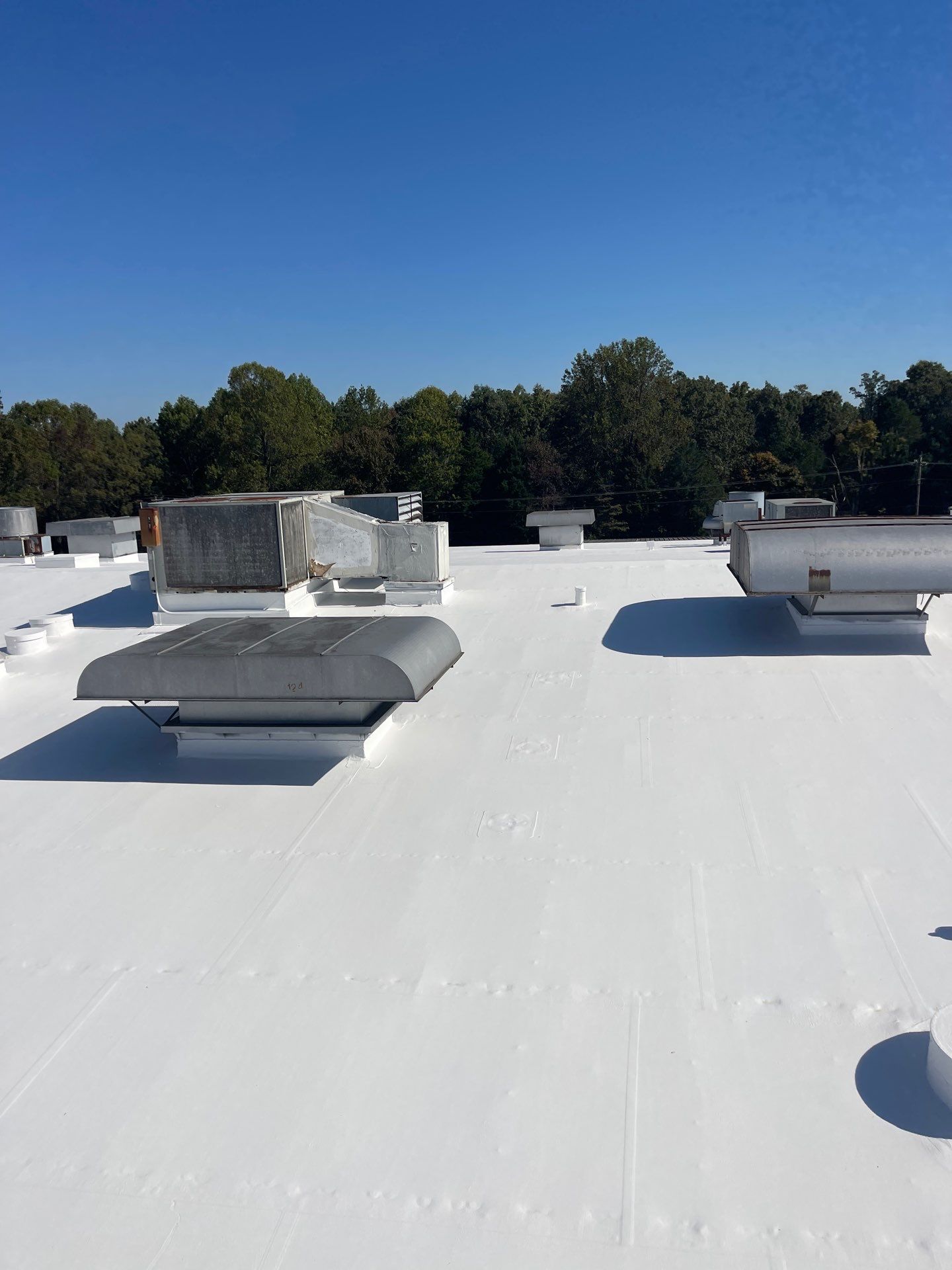 Commercial Roofing Installation using Coatings by Kentucky Commercial Roofing