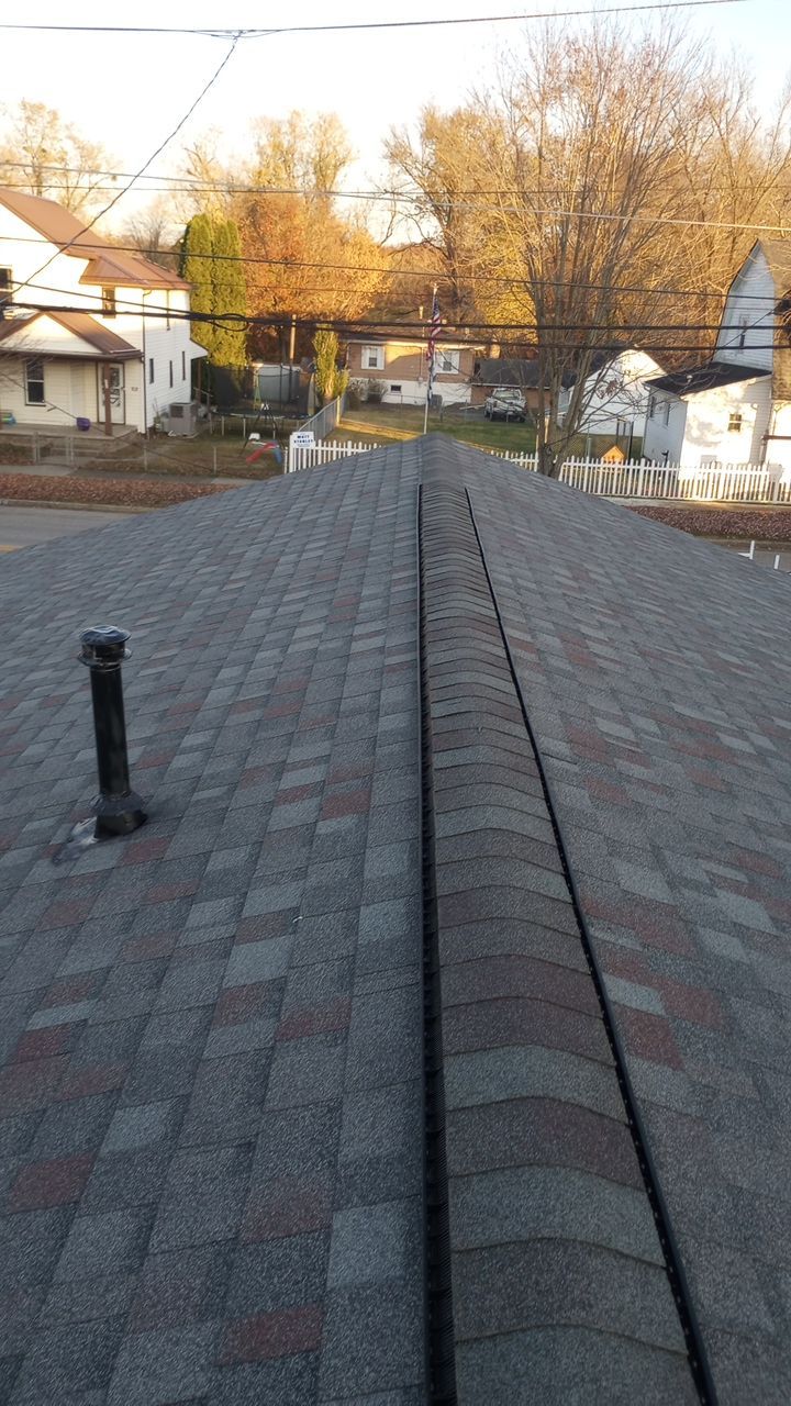 Commercial Roofing Installation using Performance Shingles by Mr. Roofer