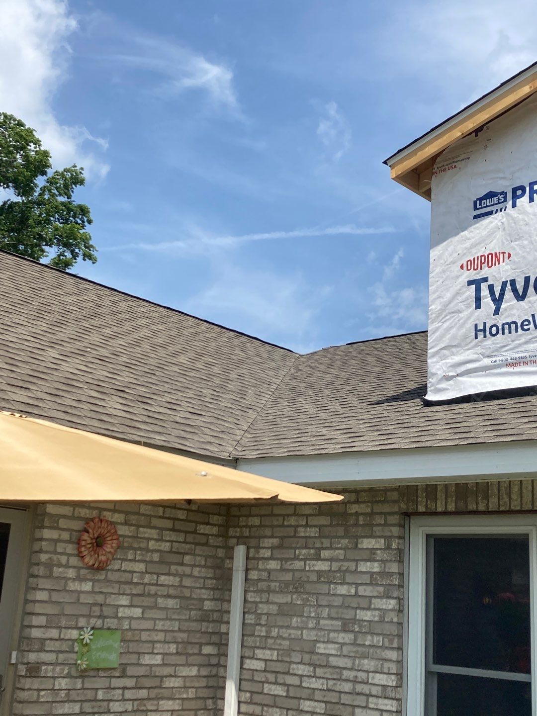 Gutter Installation using 5" Seamless Aluminum Gutters by Absolute Roofing and Construction