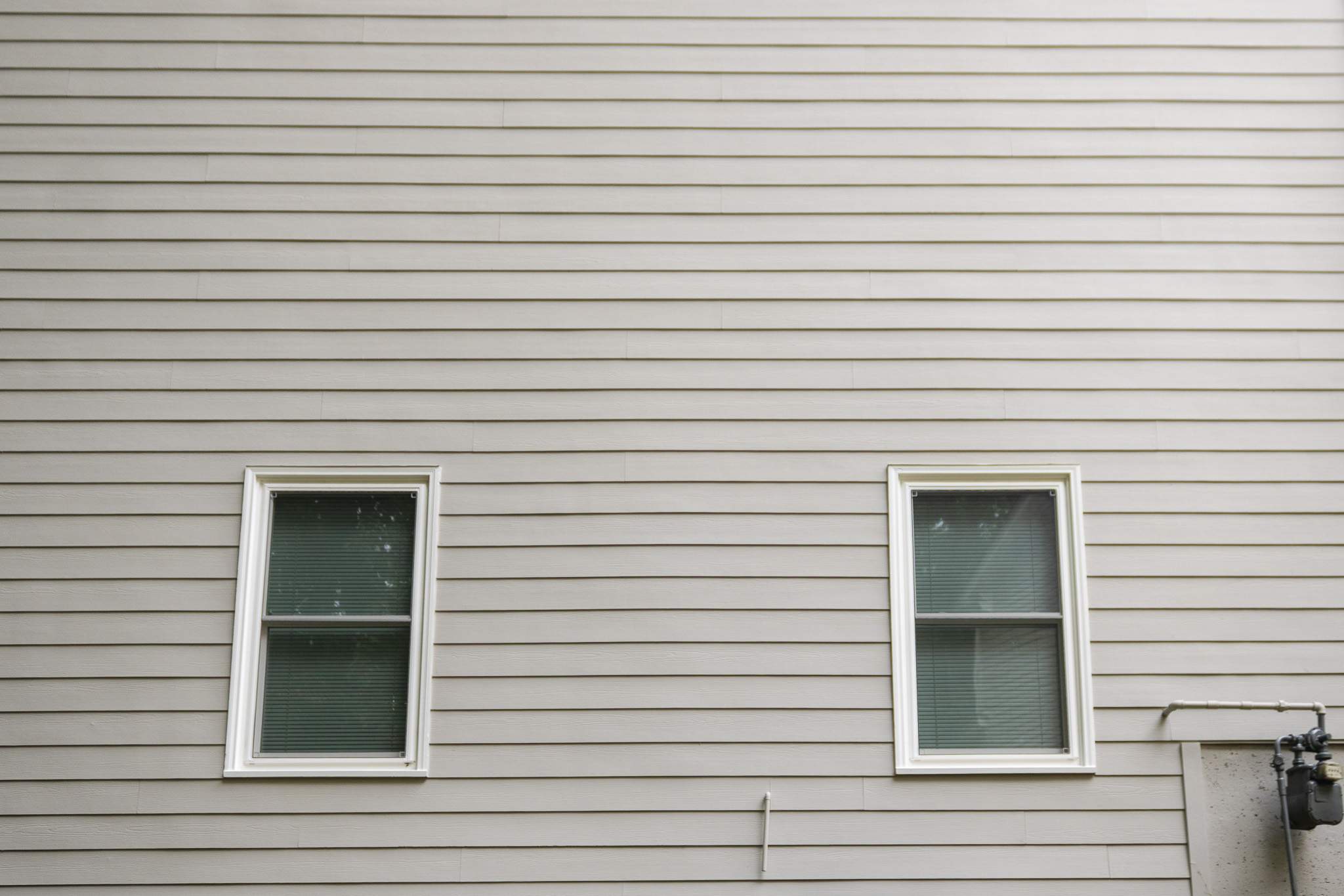 Alpharetta Siding Replacement & Wrought Iron Railing Painting by Nelson Exteriors