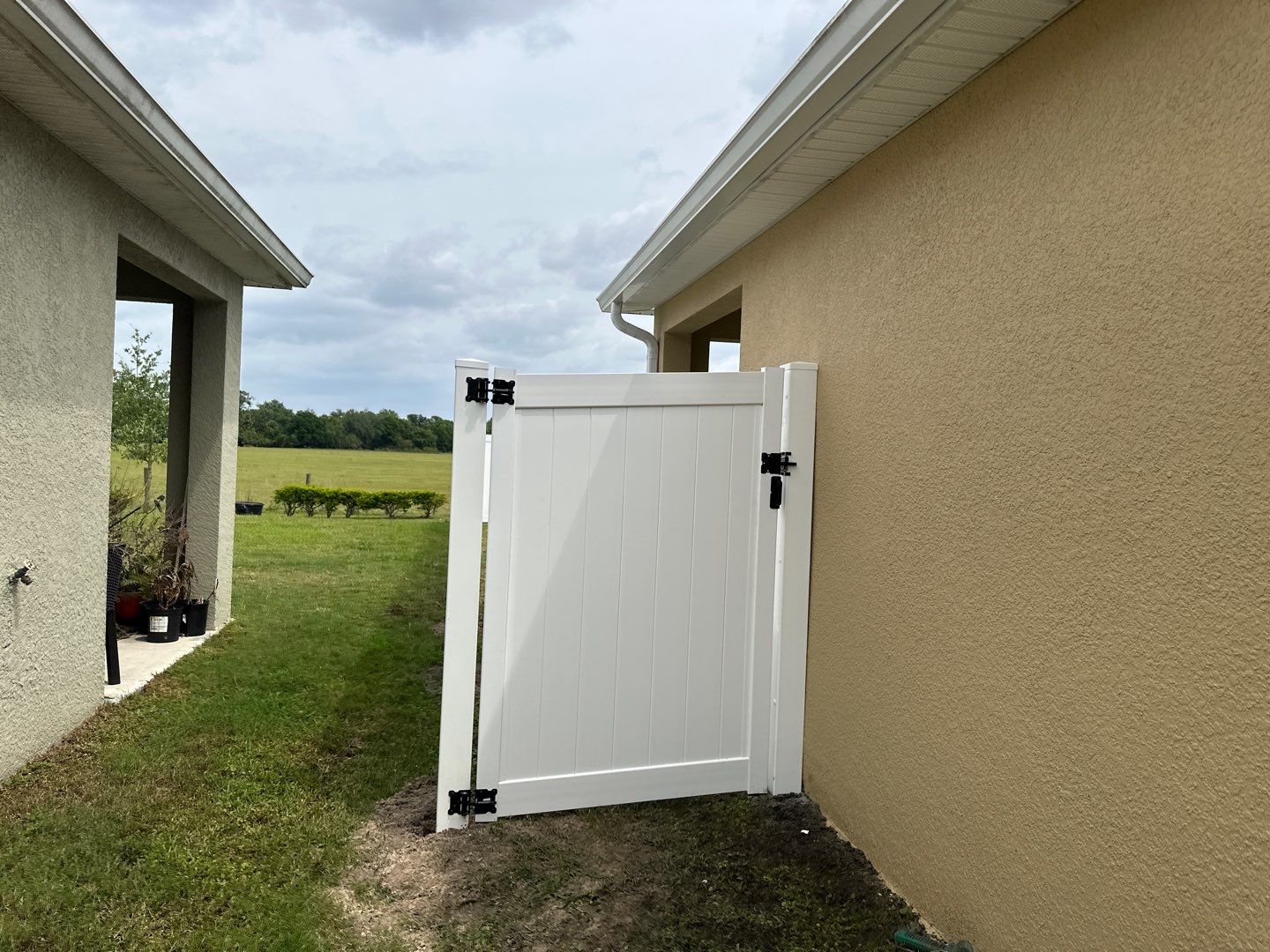 Aluminum Fence Installation using Vinyl Privacy Fence  by Asap fence and gates, LLC