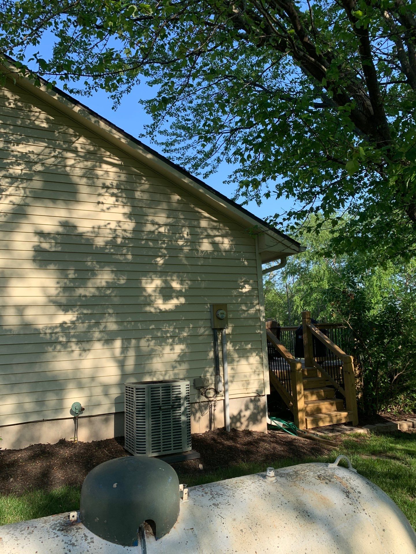 New Craneboard Siding on this Platte City, Mo home  by EEC  Windows, Siding & Roofing 
