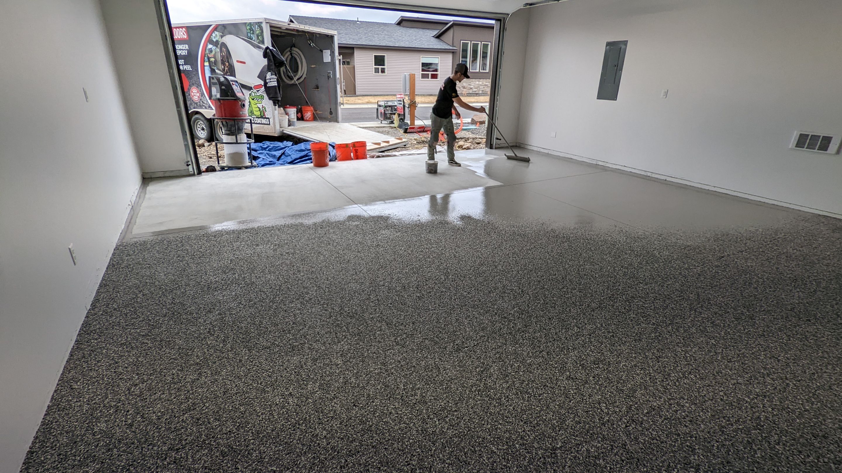 Garage Transformation using Smoke by Croc Coatings, LLC