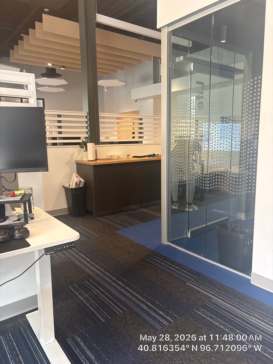 Modern Office Remodel with Acoustic Baffles and Glass Partitions by CompanyCam Sales Demo