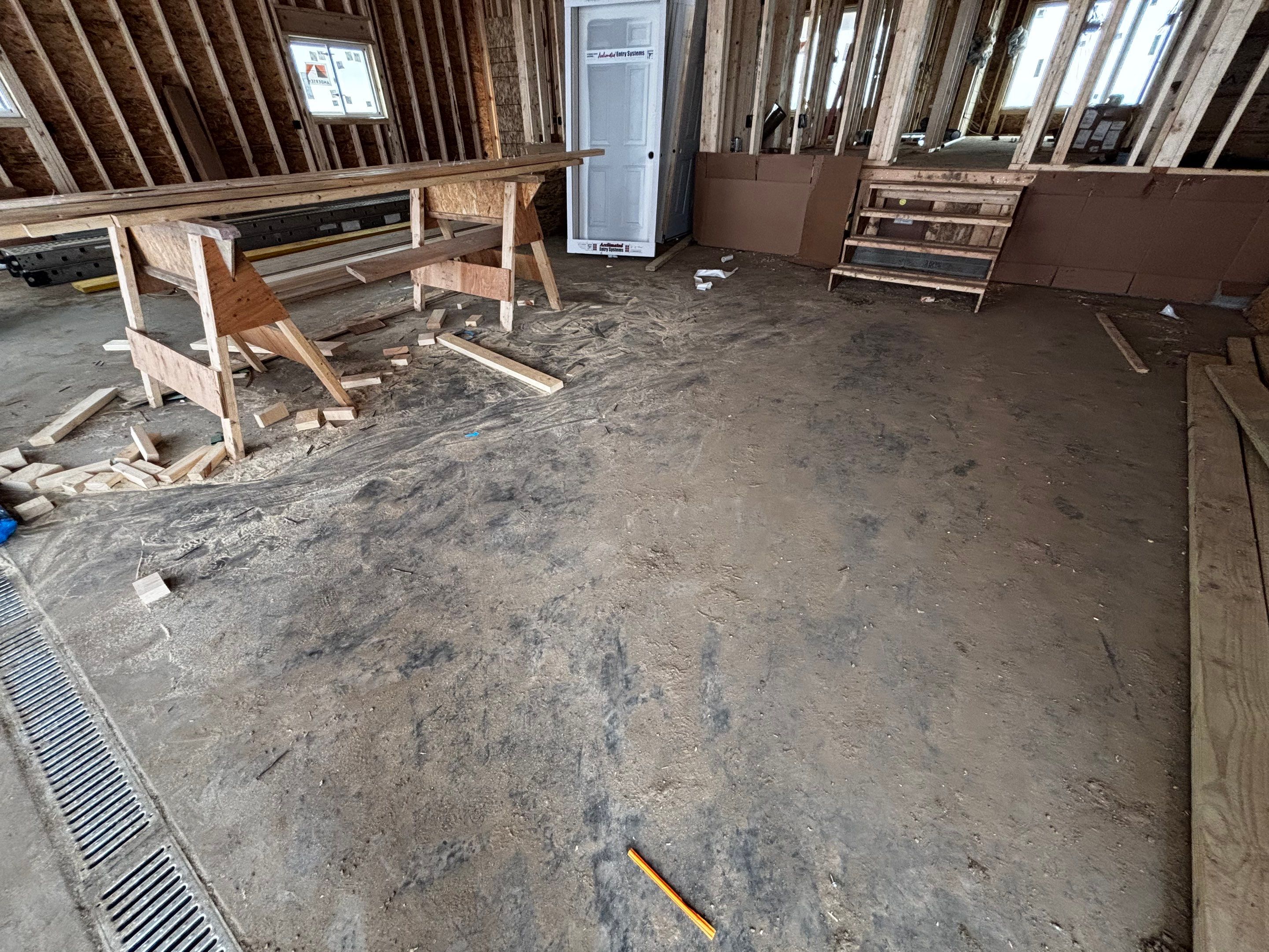 Multi-Car Garage Epoxy Floor Coating and Concrete Finishing in Sioux Falls by Select Painting, Coatings & Garage Cabinets