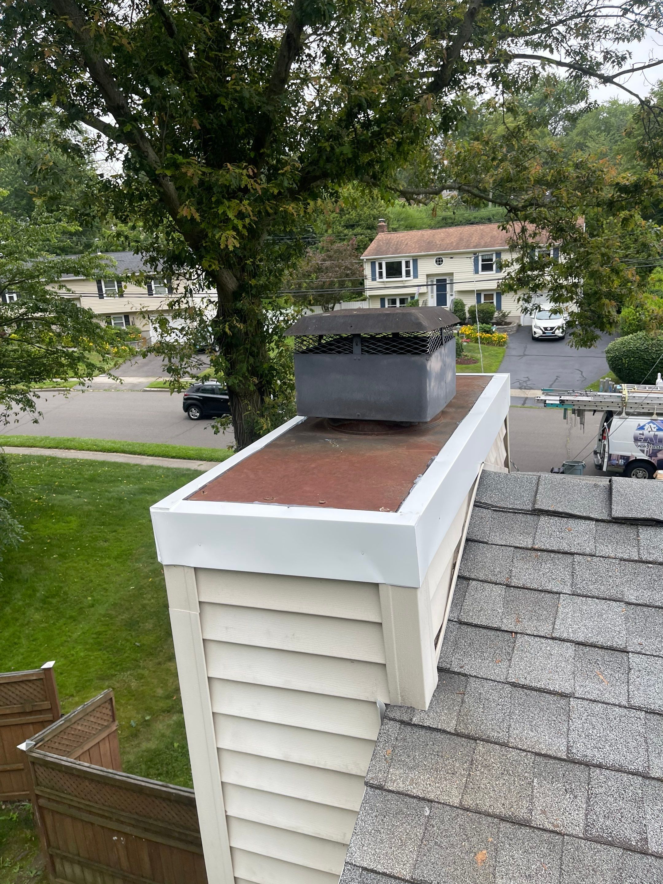 Gutter Cleaning Chimney top repair by A Plus Exterior