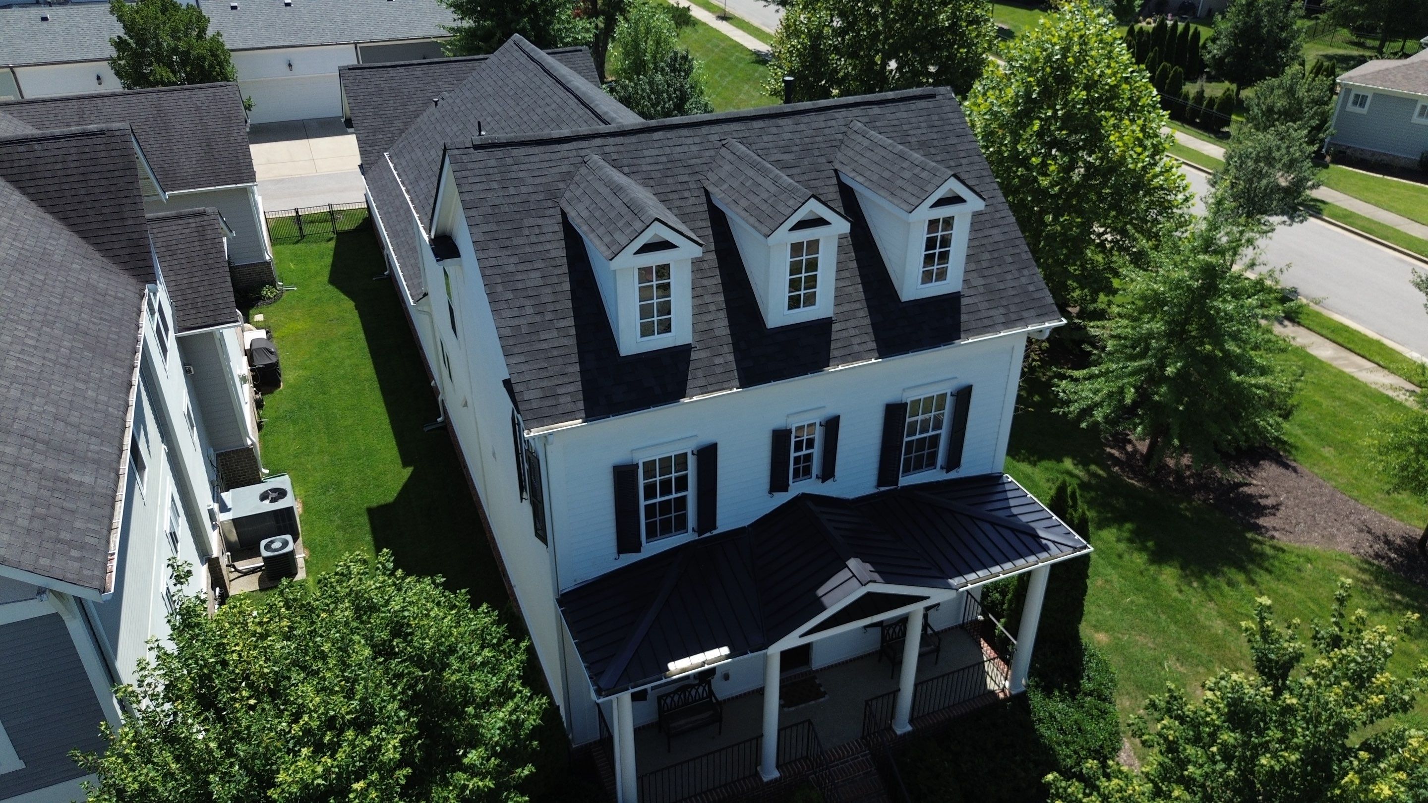Architectural Shingle and Standing Seam Metal Roof Replacement in Franklin by Shinglesmiths Roofing