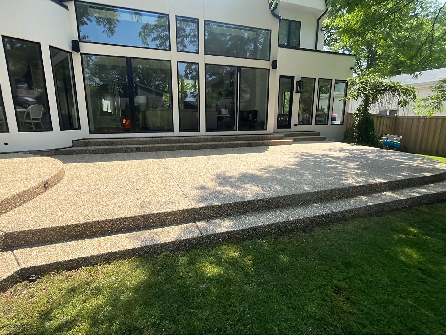 Aggregate concrete cleaning and sealing using Surebond SB-9000 by Northern Power Washing LLC.