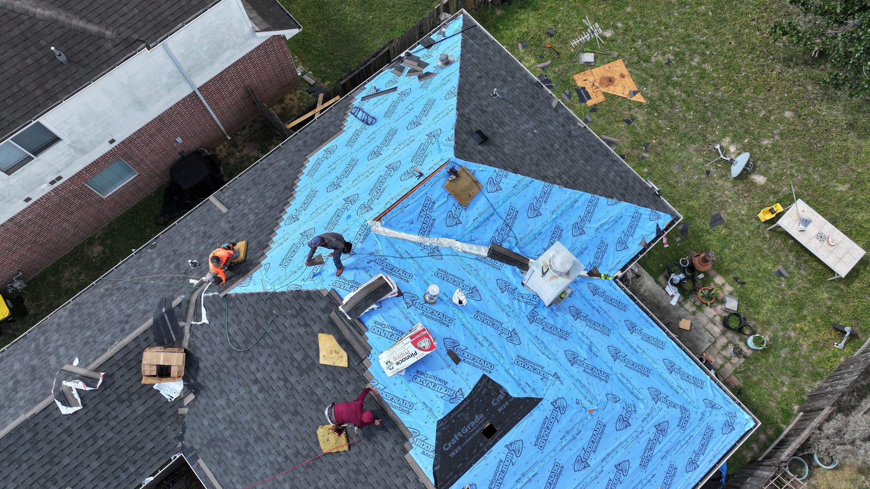 Full Roof Replacement on Brick Two-Story — Conroe, TX by PL Roofing & SB Roofing, LLC.