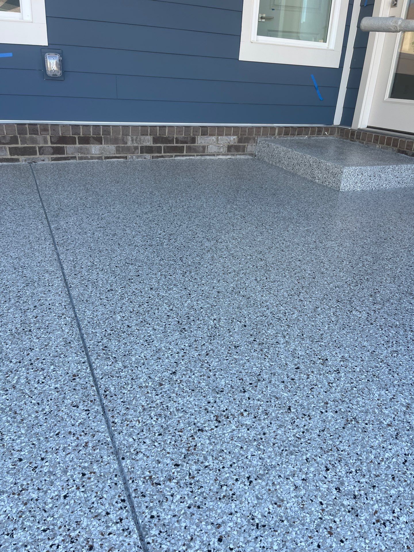 Patio Floor Coating using Coyote by My Garage Floor Guys