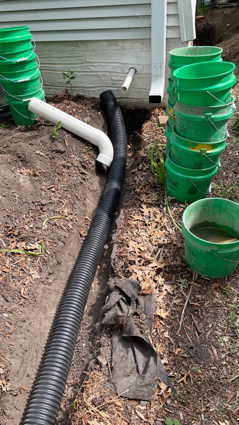 Drain Tile, Window Wells & Buried Discharge in Minneapolis by Waterproofing Northeast