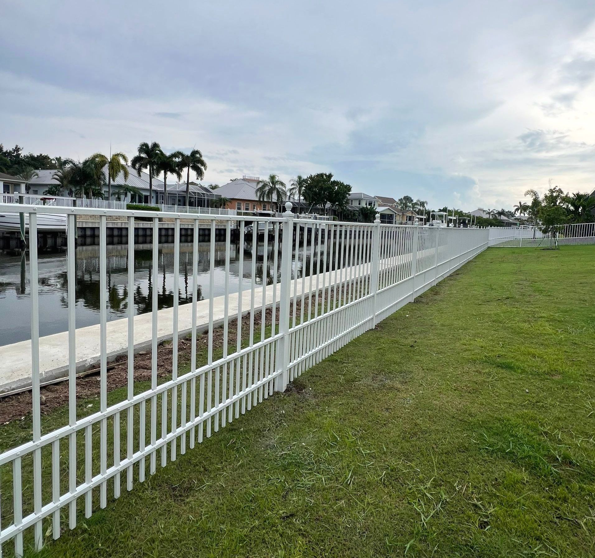 Aluminum Fence Installation using White Aluminum Puppy Picket Fence by Asap fence and gates, LLC