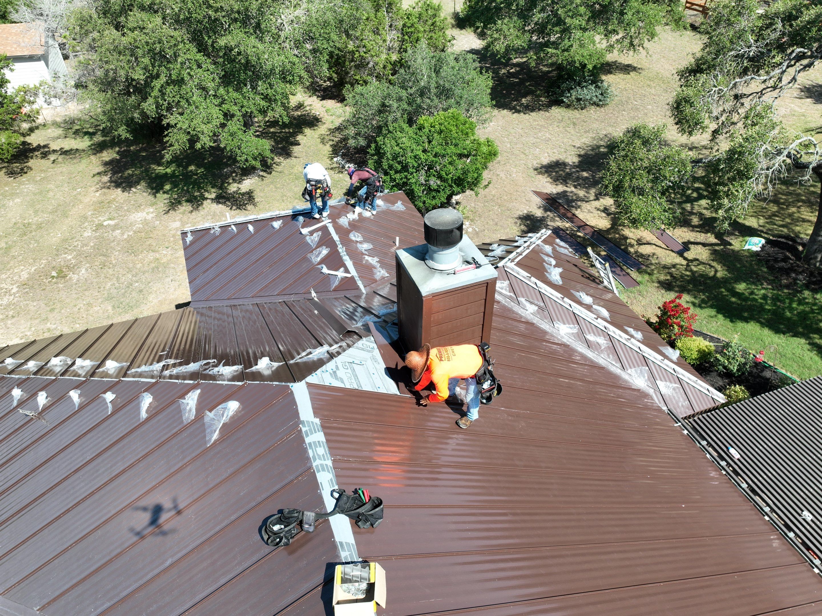 Residential Metal Roof Installation using McElroy Metal by Premier Roofing and Contracting