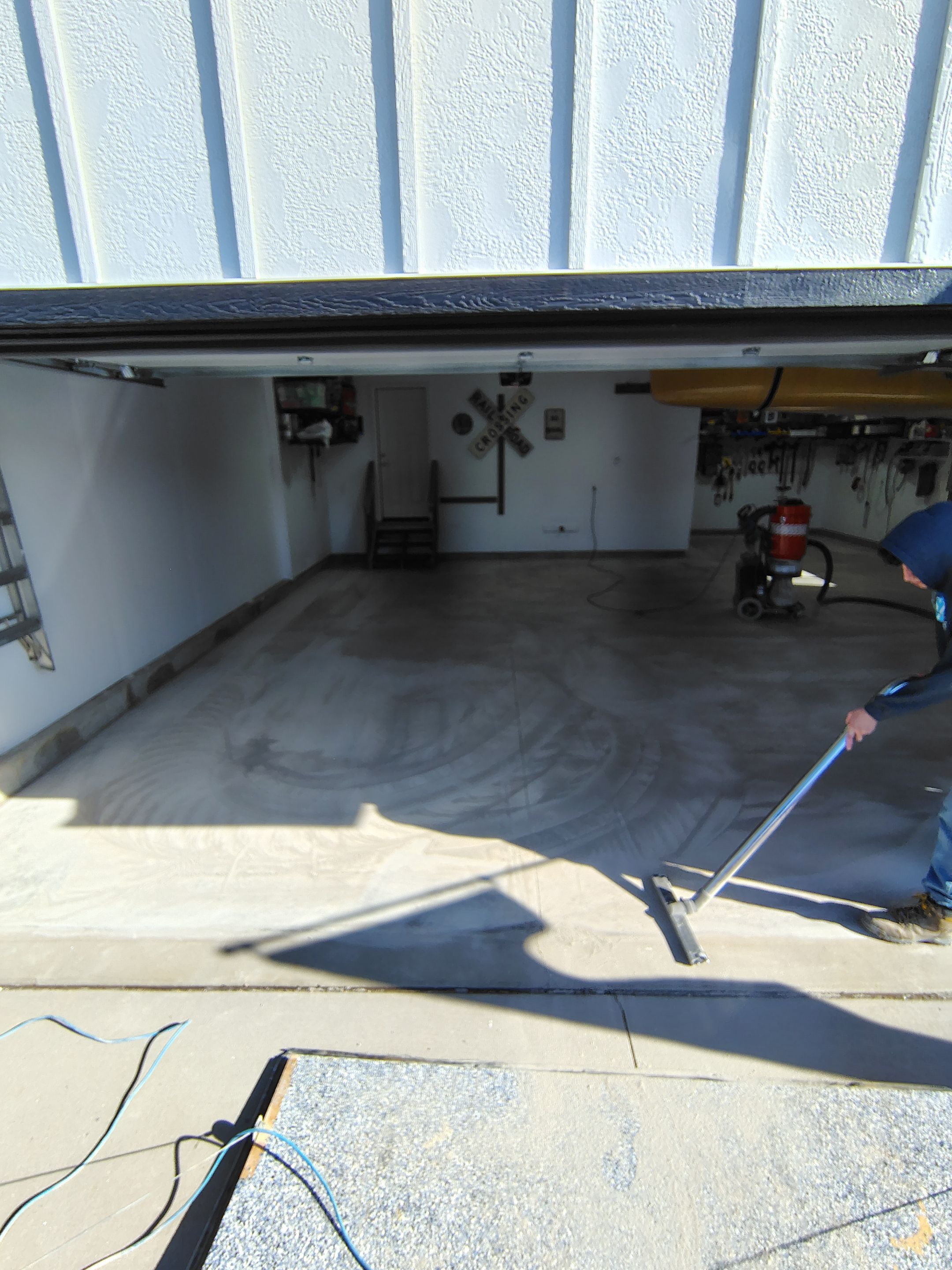 Decorative Flake Garage Floor Coating Installation in Tea, South Dakota by Select Painting, Coatings & Garage Cabinets