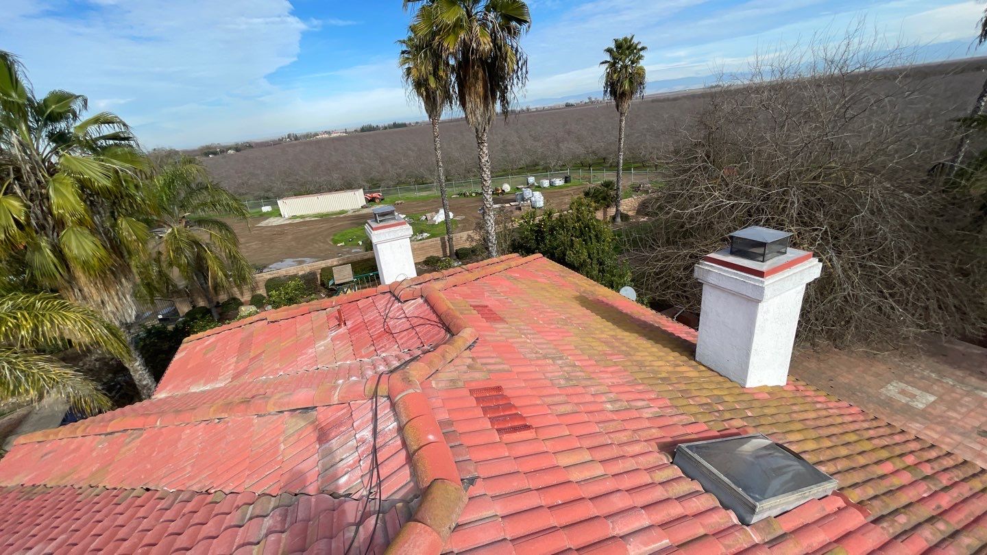 Tile refurbish project using existing tiles and replaced underlayment and battens by Straight Edge Roofing Inc